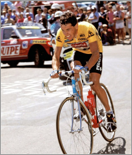 Stephen Roche bears the weight of the maillot jaune on the Alpe d’Huez, 1987